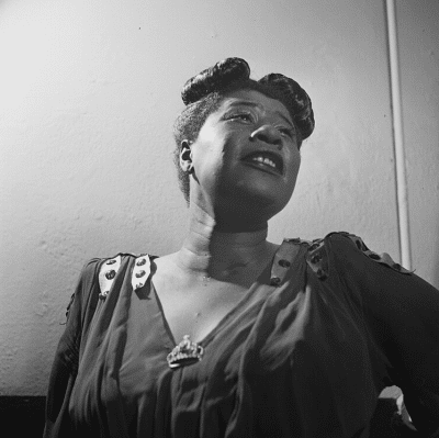 “A Baker’s Dozen Playlist of Ella Fitzgerald Specialties from Five Decades,” as selected by Ella biographer Judith Tick